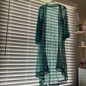 Turquoise/Green cover up , size small but could fit a medium